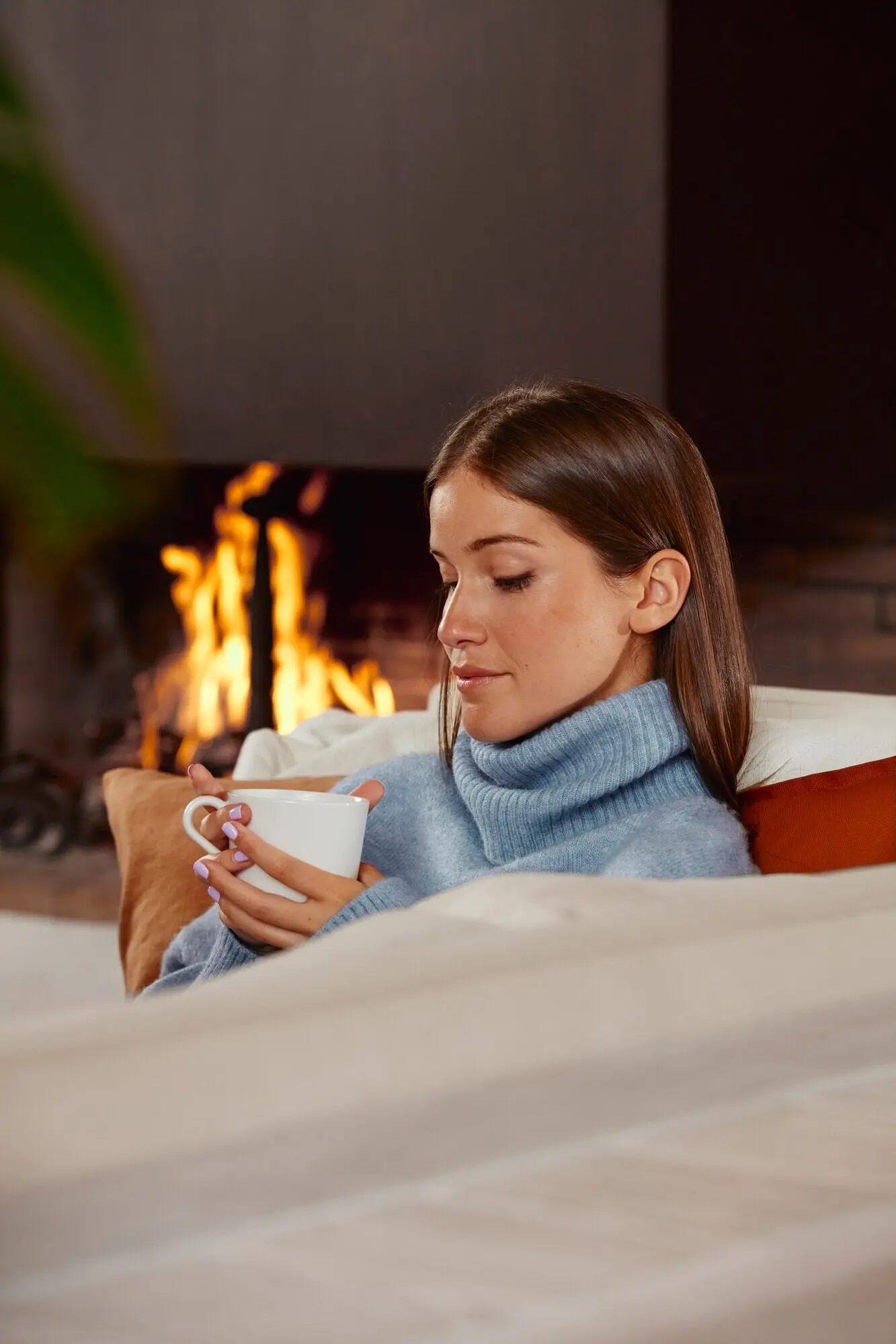 A young woman doing her job from home.